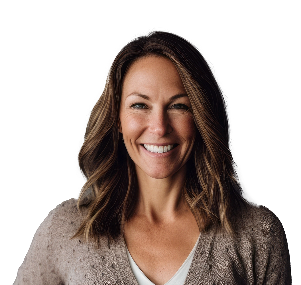 smiling woman standing against gray background and looking at camera